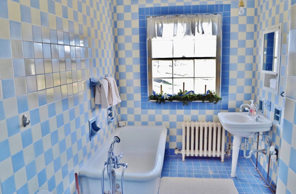 Blue tiled bathroom