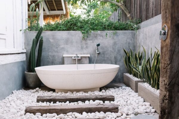 Outdoor bathtub with shower head