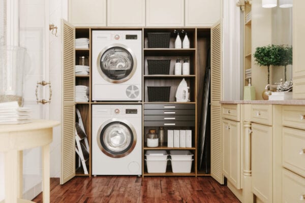 Washing machine and dryer in a luxury bathroom.