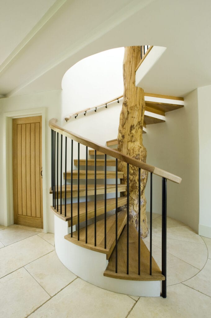 Modern staircase built around tree