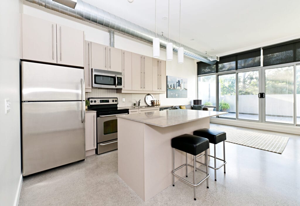 Kitchen and living room of loft apartment - artwork from photographer portfolio