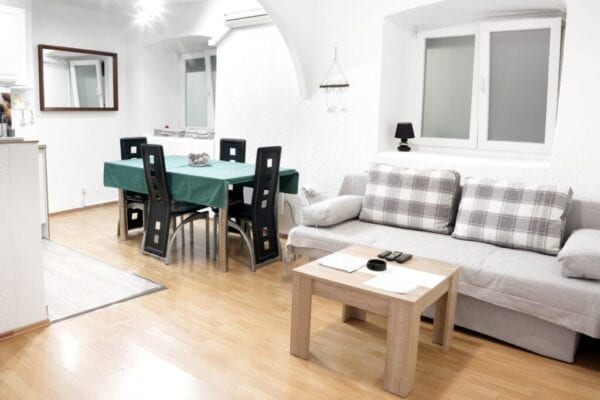 Apartment with couch and dining table
