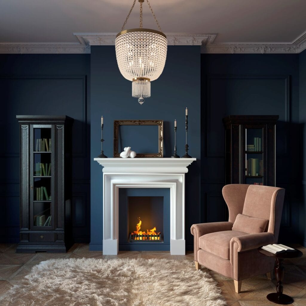 Modern living room with white wood fireplace and deep blue walls