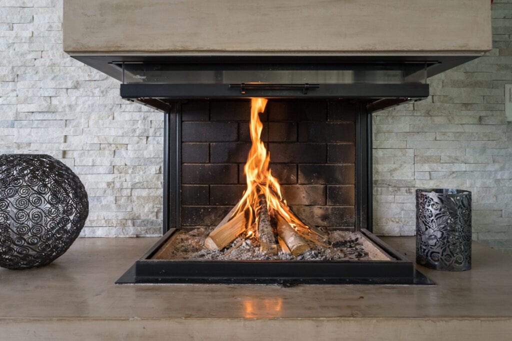 Modern luxury fireplace with brick and metal