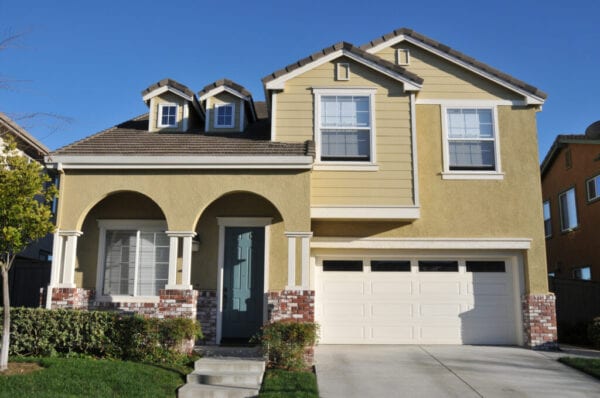 Two story single family house with driveway