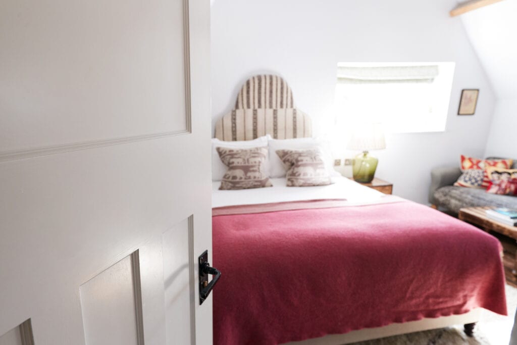 guest bedroom red blanket