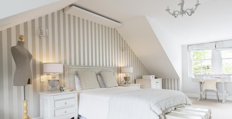 4 Ways To Align The Design In Your Sloped Ceiling Room Mymove - Bedroom Lights For Slanted Ceilings