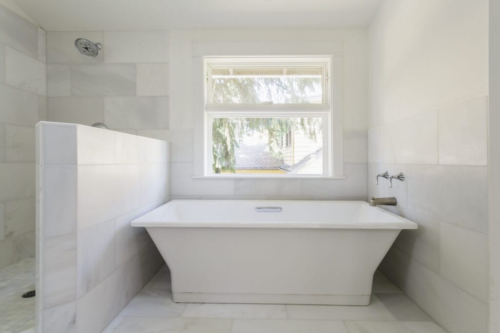 Bathtub and shower in modern bathroom