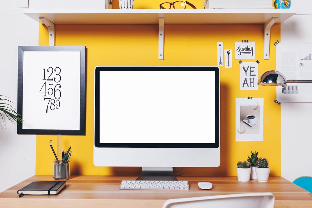 Bright yellow wall for desk