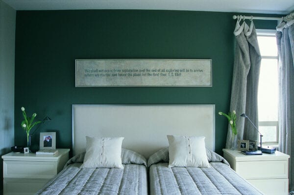 green paint room with two beds