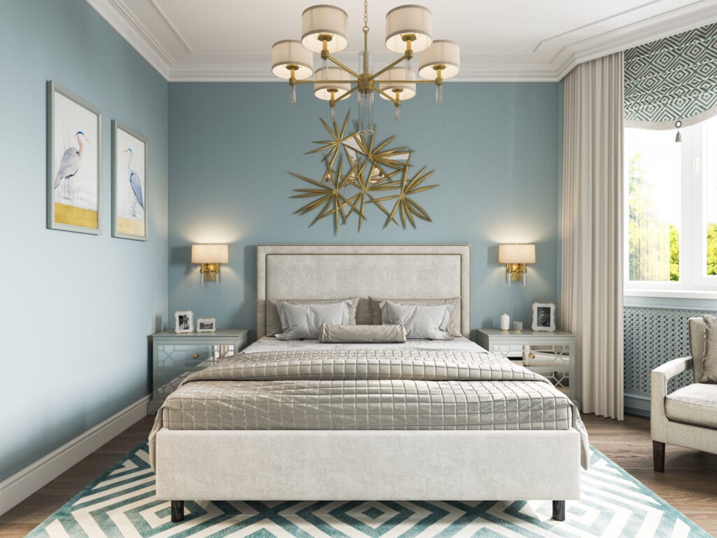 Luxury traditional bedroom with blue walls, chandelier, and sconces