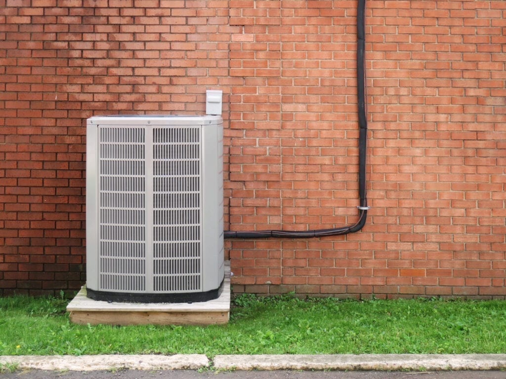 Brick wall with HVAC unit