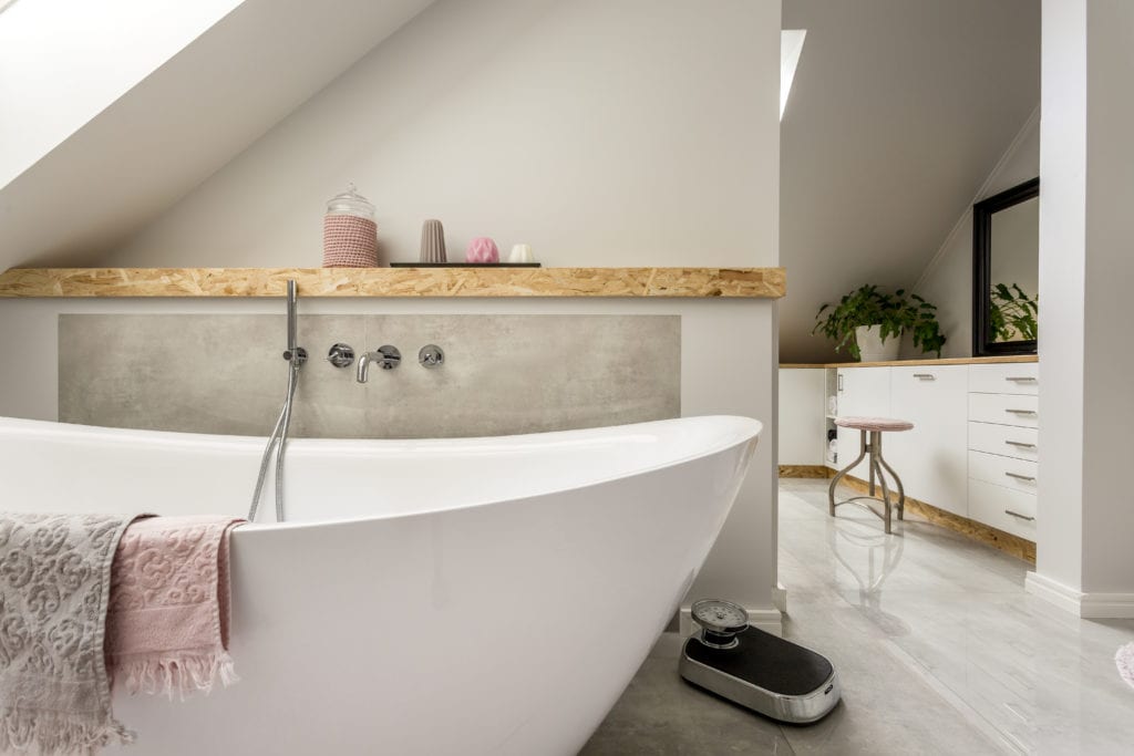 Light gray bathroom with blush pink accents