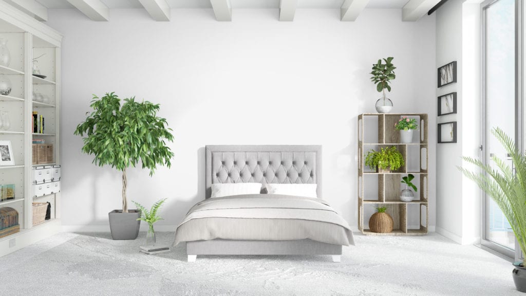 White bedroom with gray bed