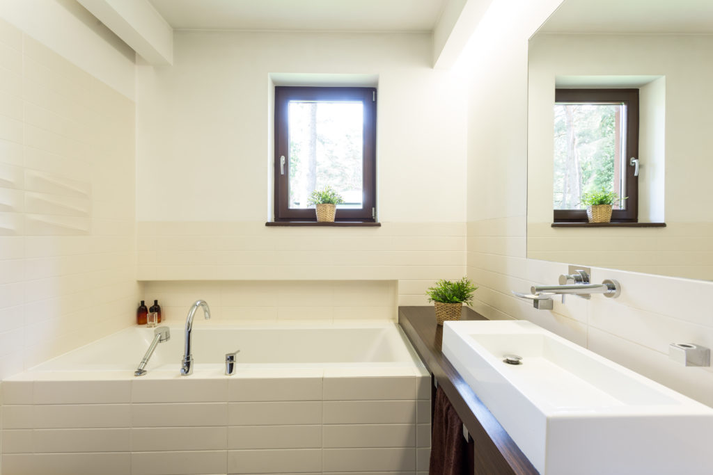 Off-white bathroom with sunny window