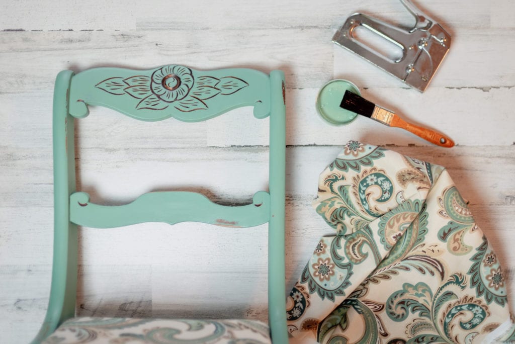 A vintage chair gets a makeover with a coat of teal chalk paint