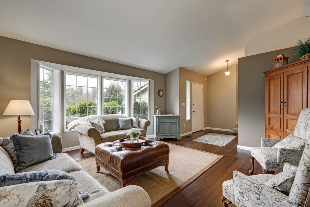 Old-world style taupe colored living room