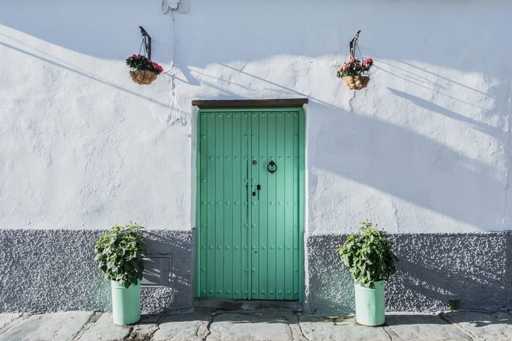 seafoam green door in Sevilla, Spain