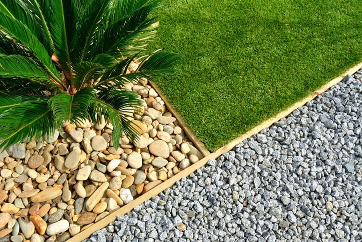 Landscaping combinations of grass, plant and stones