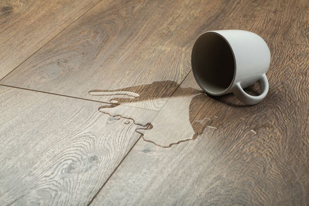 Spill on laminate floor that needs to be cleaned