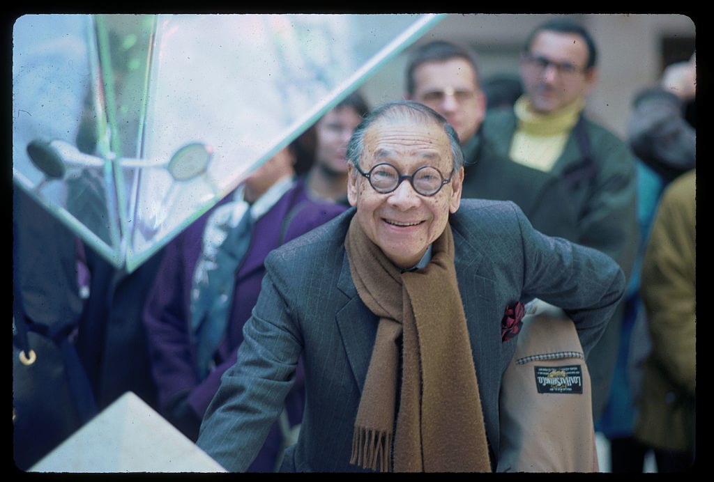 Architect I.M. Pei stands beside the tip of the Louvre's inverted pyramid in the Galleries of the Carrousel. He designed the glass and metal pyramids to serve as an entrance to the Louvre museum. (Photo by Owen Franken/Corbis via Getty Images)