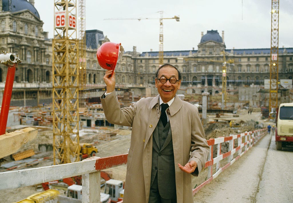 I.M. Pei, the architect of the Louvre's glass Pyramid Entrance, stands at the entrance's construction site. (Photo by THIERRY ORBAN/Sygma via Getty Images)