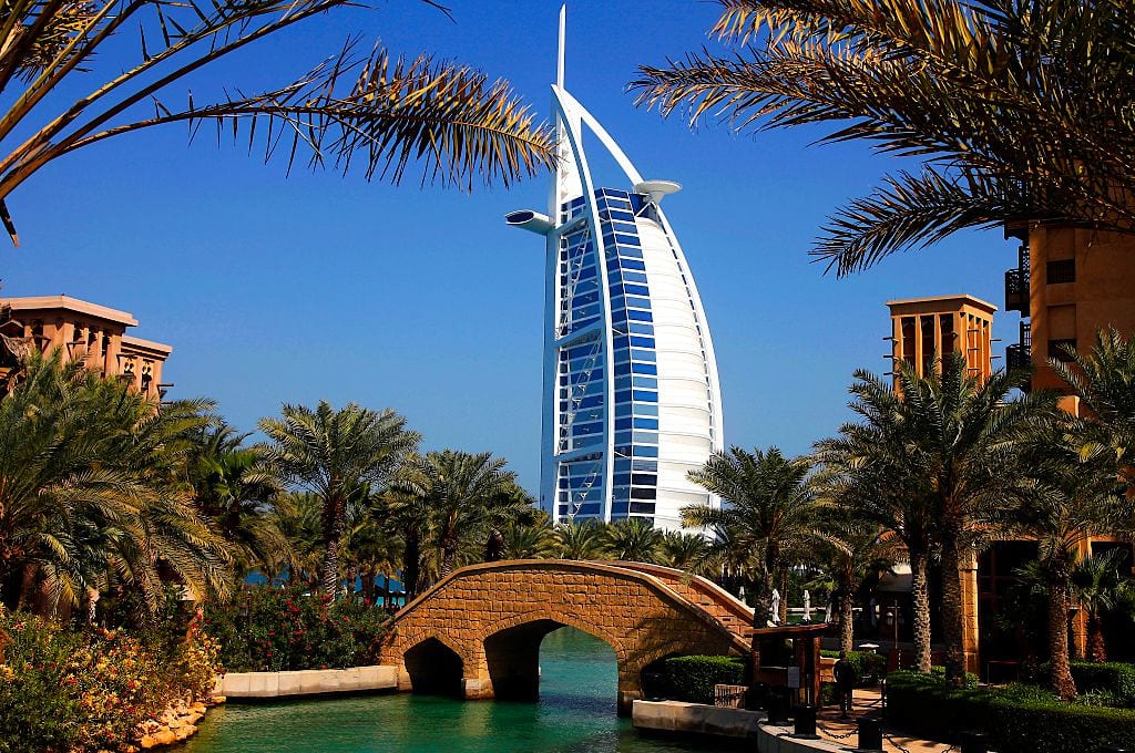 Dubai, United Arab Emirates (2013): Burj al-Arab (Tower of the Arabs) luxury hotel, self-proclaimed 7-star hotel. 321 metres high, it was the tallest hotel in the world until 2007. It was designed in 1993 by architect Tom Wright. It stands in the Persian Gulf, on an articifial island, and the shape of the structure is designed to mimic the sail of a ship. (Photo by: Andia/Universal Images Group via Getty Images)