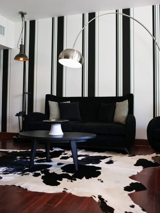 Rug accents the dramatic design