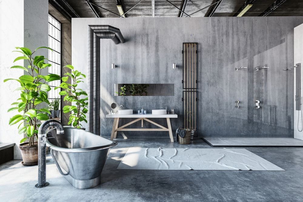 Exposed pipes create an industrial vibe in this bathroom