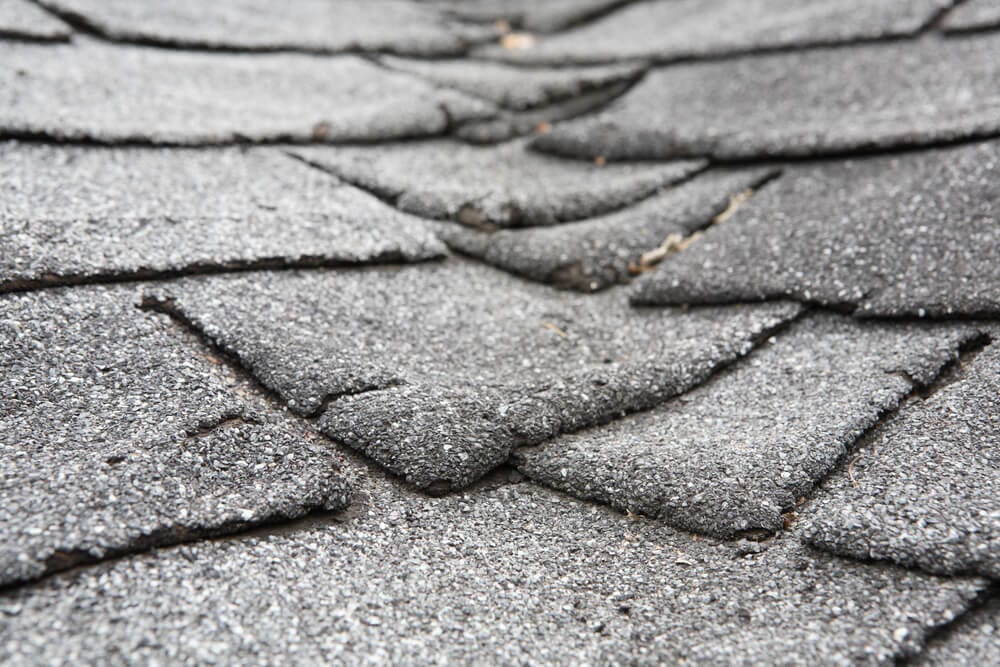 Replace Your Roof Cracked Shingles