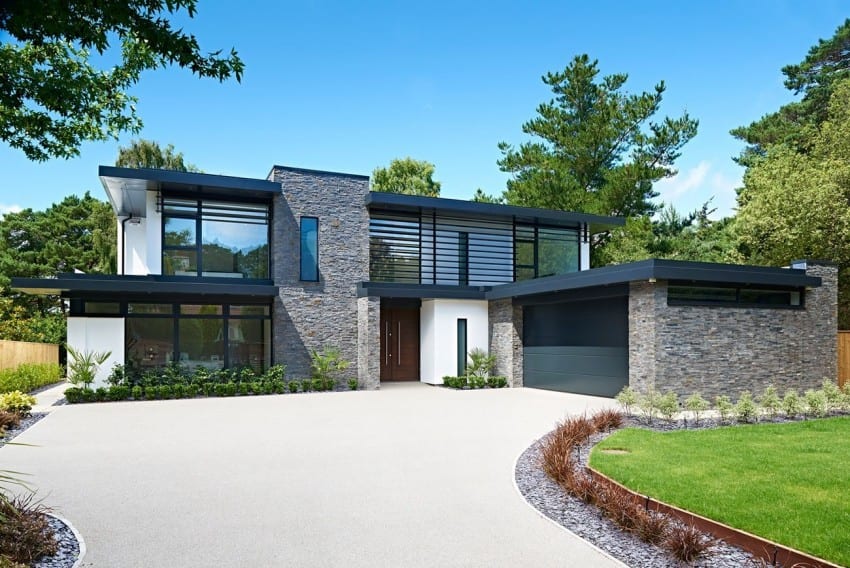 Contemporary House in England Combines Stone and Glass