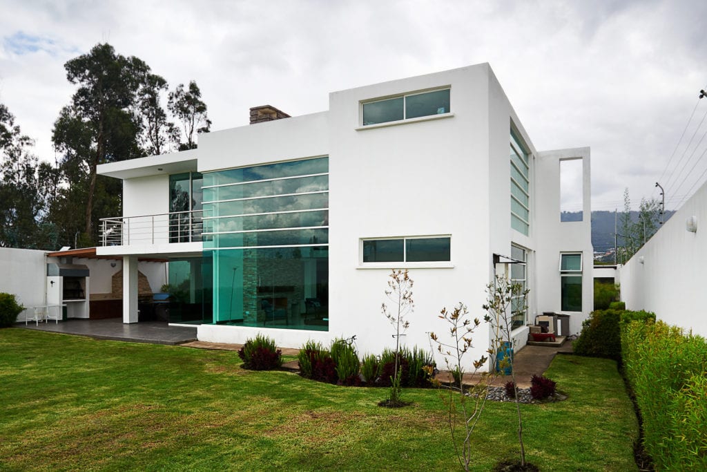 Large modern house with white exterior and big windows