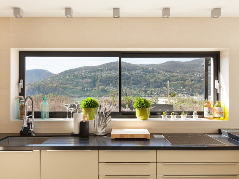 Modern kitchen with picture window 