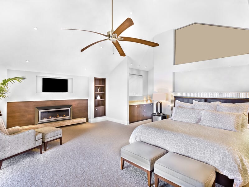 Large master bedroom with ceiling fan