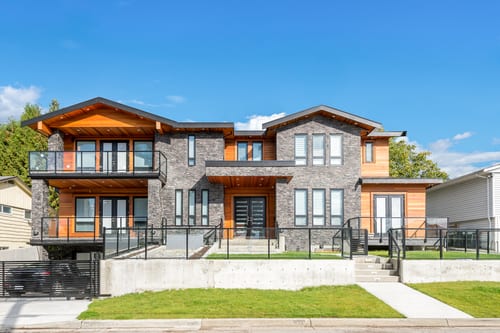 Modern home with stone accents multigenerational homes