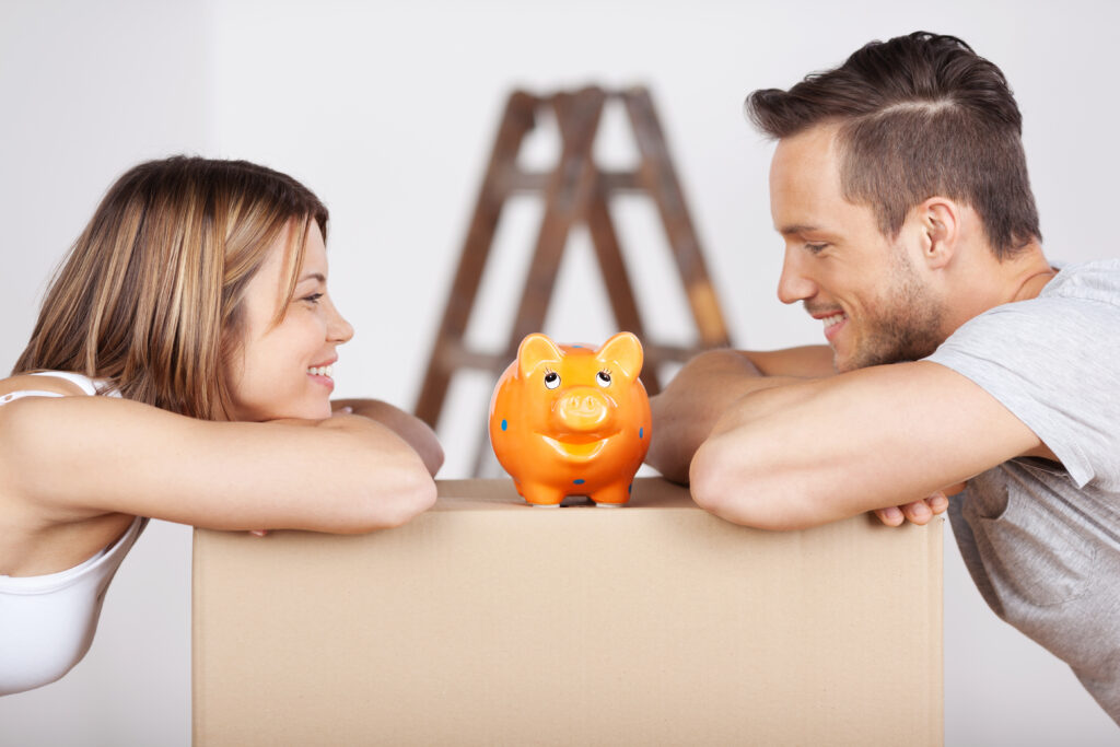 couple over piggy bank