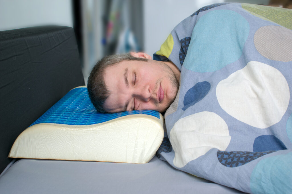 mansleeping on a gel mattress