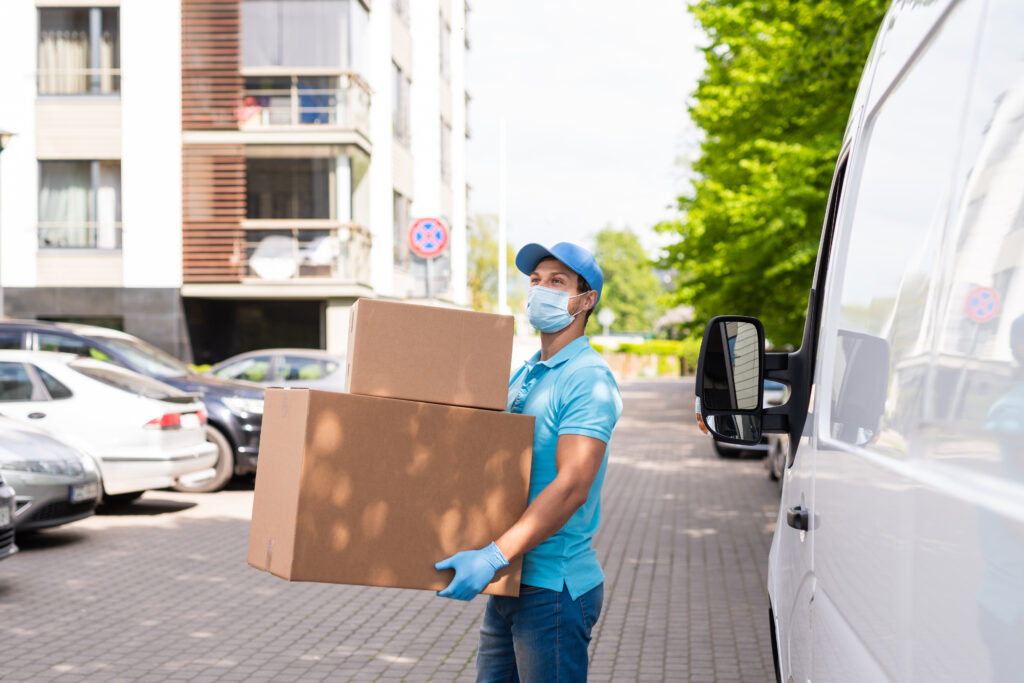 Young man moving while wearing a mask during the coronavirus pandemic