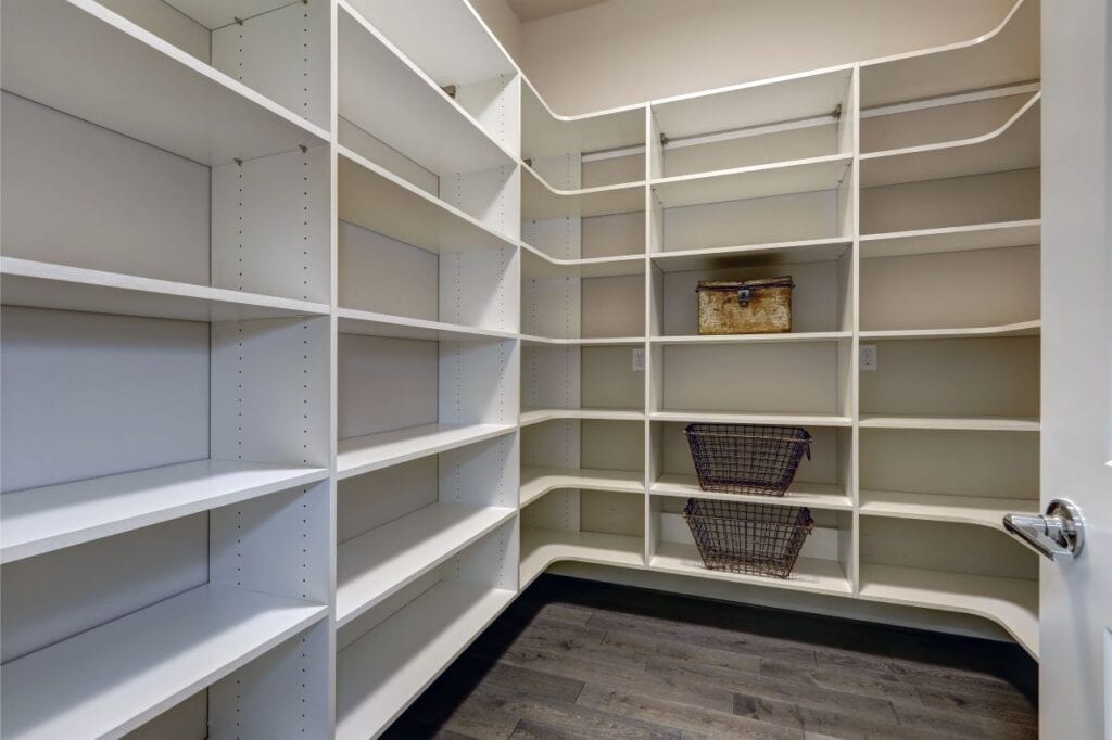 Pantry room with lots of shelves and greige wall paint