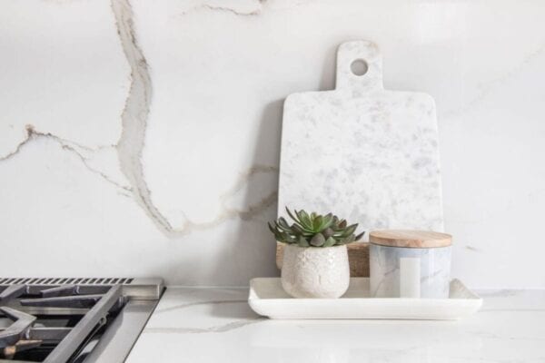 Marble-style backsplash in kitchen