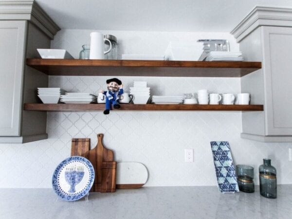 Kitchen decorated with hanukkah plates and other items