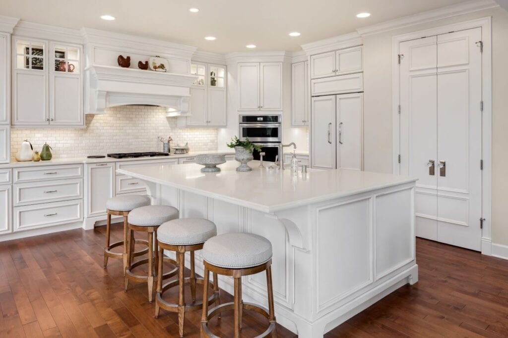 Traditional luxury kitchen with island and barstools