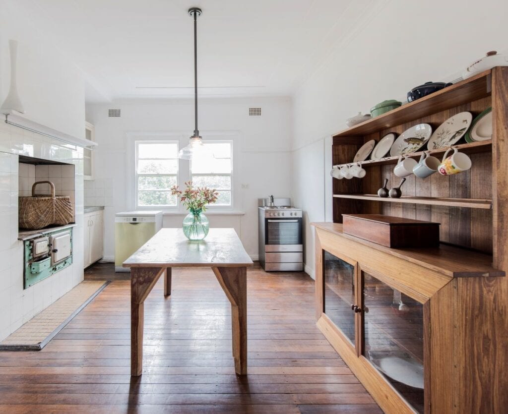 Kitchen with cabinet to display antique dishes