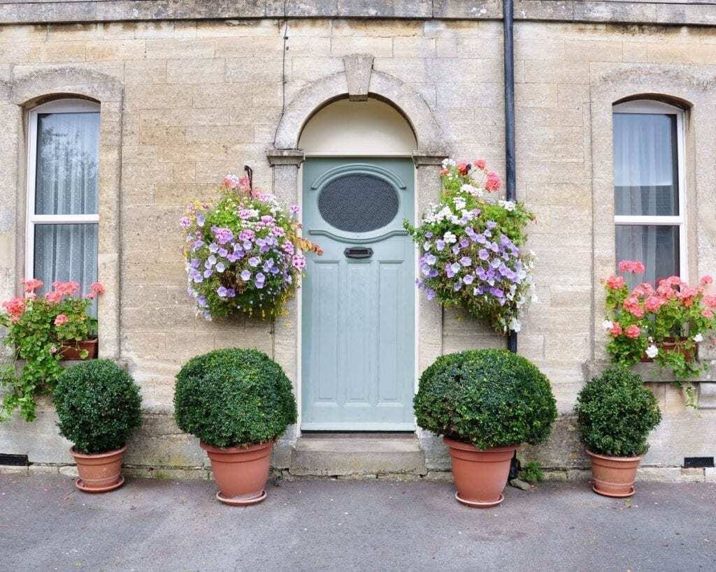 Townhouse landscaping with potted plants