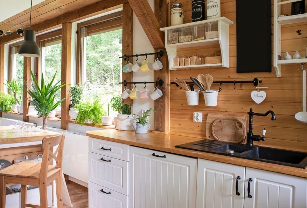 Remodeled rustic kitchen with bright white cabinets