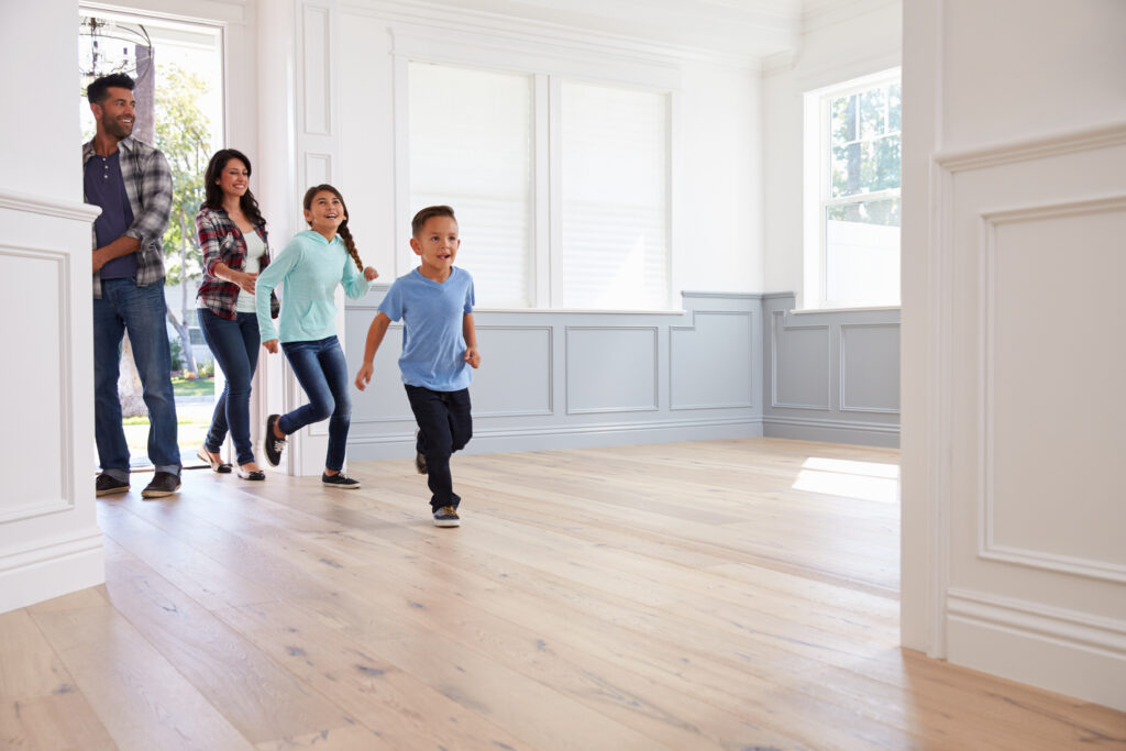 family entering new home