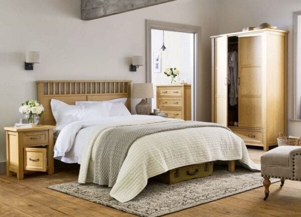 Bedroom furniture arranged to maximize space