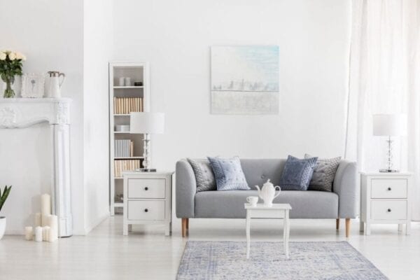 Well-decorated living room with fresh coat of white paint