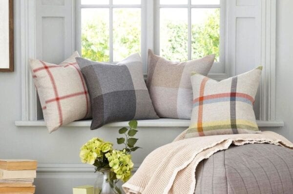 Decorative throw pillows add a finishing touch to the windowsill