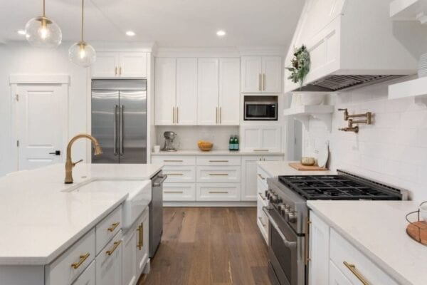 Kitchen is newly decorated with white-painted ktichen cabinets